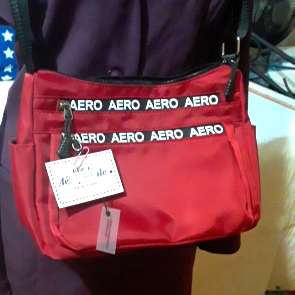 Aeropostale sports shoulder bag/cross body, brand new, raincoat material.